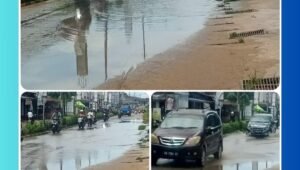Jalan Juang Km.1 Nanga Pinoh Kabupaten Melawi tergenang air akibat hujan deras dan drainase tersumbat, Kamis (19/2/2026).