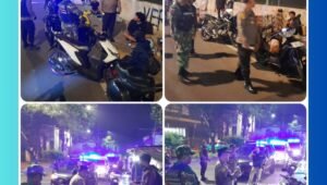 Patroli gabungan TNI-Polri dan elemen masyarakat sedang melakukan patroli di Jalan Raya Cinere, Depok untuk menjaga kamtibmas pada 24 Februari 2026.