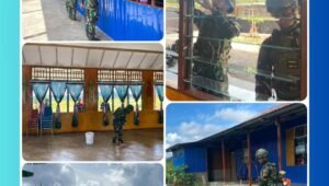 Personel Satgas Yonif 521/DY bersama masyarakat dan jemaat melakukan karya bhakti membersihkan lingkungan Gereja GBI Distrik Elelim Yalimo