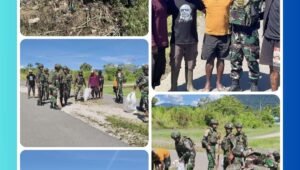 Personel Satgas Yonif 521/DY bersama masyarakat melakukan pembersihan lingkungan dalam kegiatan karya bakti di Distrik Kobakma, Papua Pegunungan – 28 Februari 2026