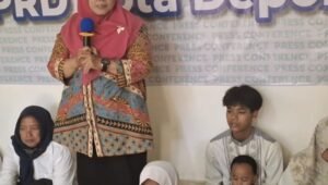 Kasi Humas DPRD Kota Depok Ida Juraidah berikan sambutan di acara bukber Wartawan Media Center - thewasesanews.com