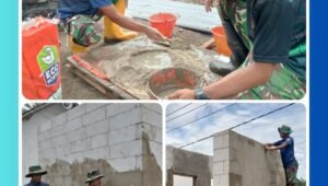 Prajurit Satgas TMMD Ke-127 Kodim 0819/Pasuruan bekerja bersama warga membangun fasilitas MCK di Dusun Wonosalam, Desa Wonosari, Minggu (1/3/2026).
