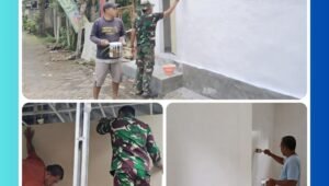 “Prajurit Satgas TMMD Ke-127 sedang mengecat dinding mushola Dusun Kili, Desa Wonosari Pasuruan dengan ketelitian tinggi – bagian dari proyek renovasi fasilitas ibadah yang dilakukan secara gotong royong bersama masyarakat.”