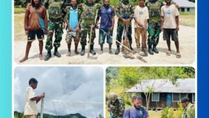 Satgas Yonif 521/DY Perbaiki Fasilitas Olahraga di Distrik Apalapsili Papua.