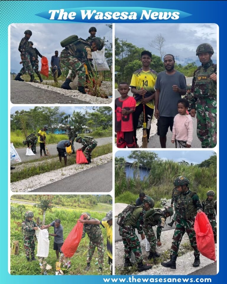 Para personel Satgas Yonif 521/DY dan pemuda Distrik Kobakma berfoto bersama setelah menyelesaikan kegiatan karya bakti pembersihan jalan kampung di Kabupaten Mamberamo Tengah, Papua Pegunungan, 10 Maret 2026.