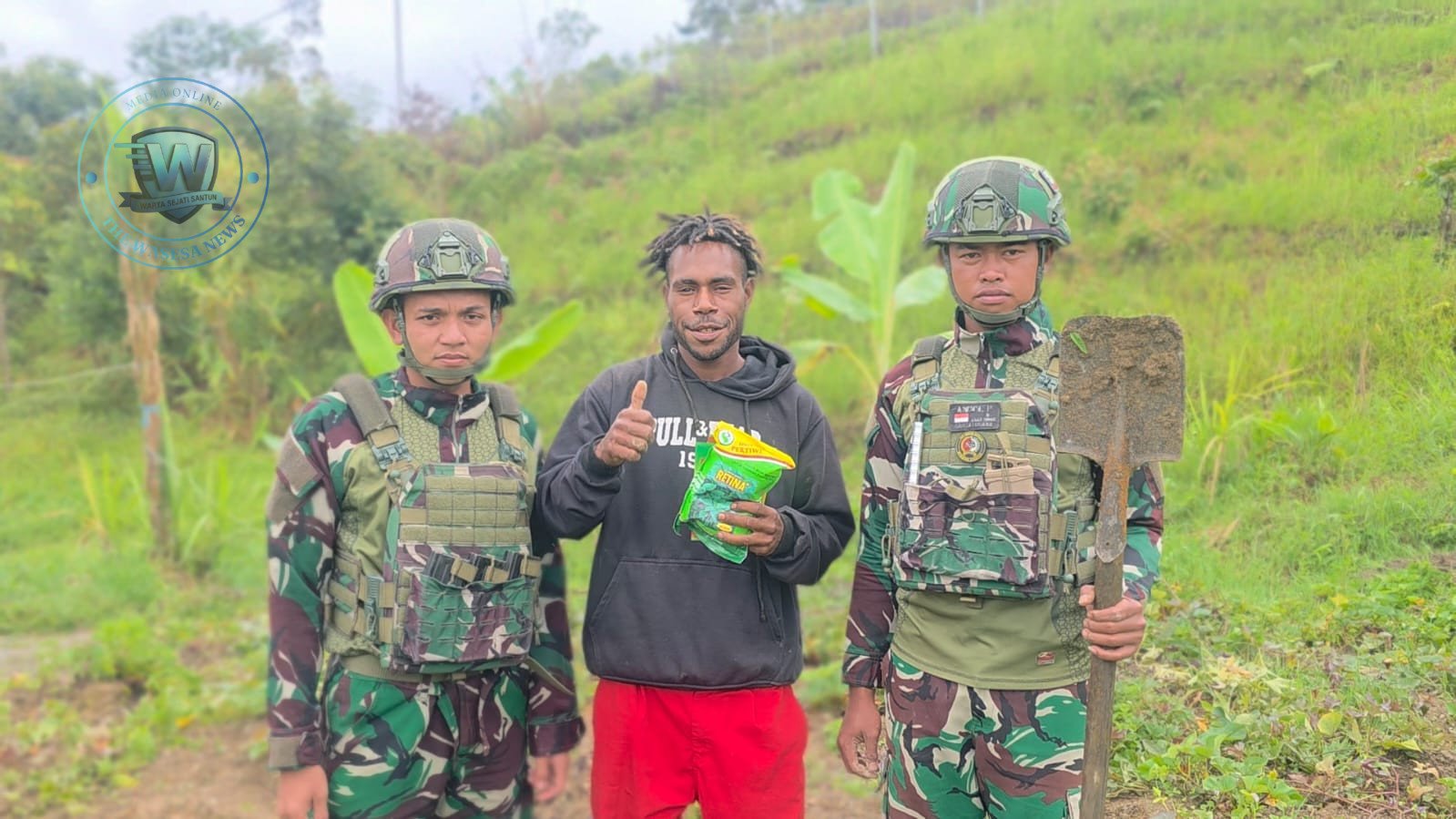 Satgas Pamtas Yonif 521 DY Perkuat Ketahanan Pangan Papua Pegunungan Bagikan Bibit Pertanian di Distrik Eragayam. - thewasesanews.com