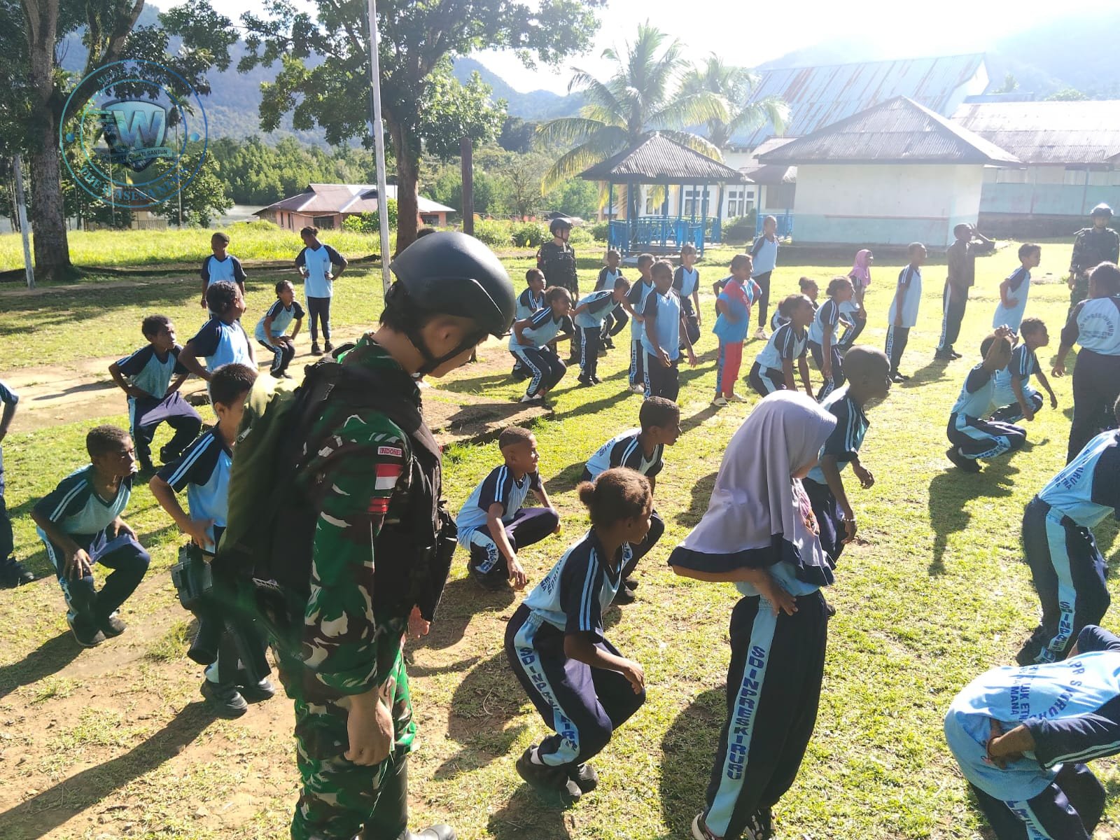 Satgas Yonif 410 Alugoro Gelar Senam Gembira di SD Inpres Kiruru Papua. - thewasesanews.com