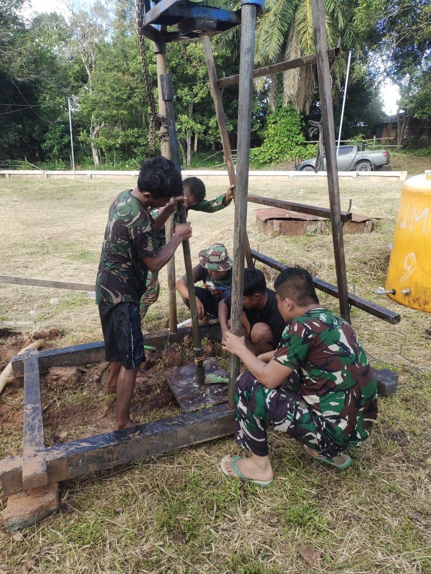 Presiden RI dan KSAD Melalui Satgas Yonif 123 Bangun Sumur Bor Mappi. - thewasesanews.com