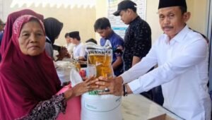 Desa Sangiang Salurkan Bantuan Pangan Bulog ke 1.868 Keluarga Penerima Manfaat. - thewasesanews.com