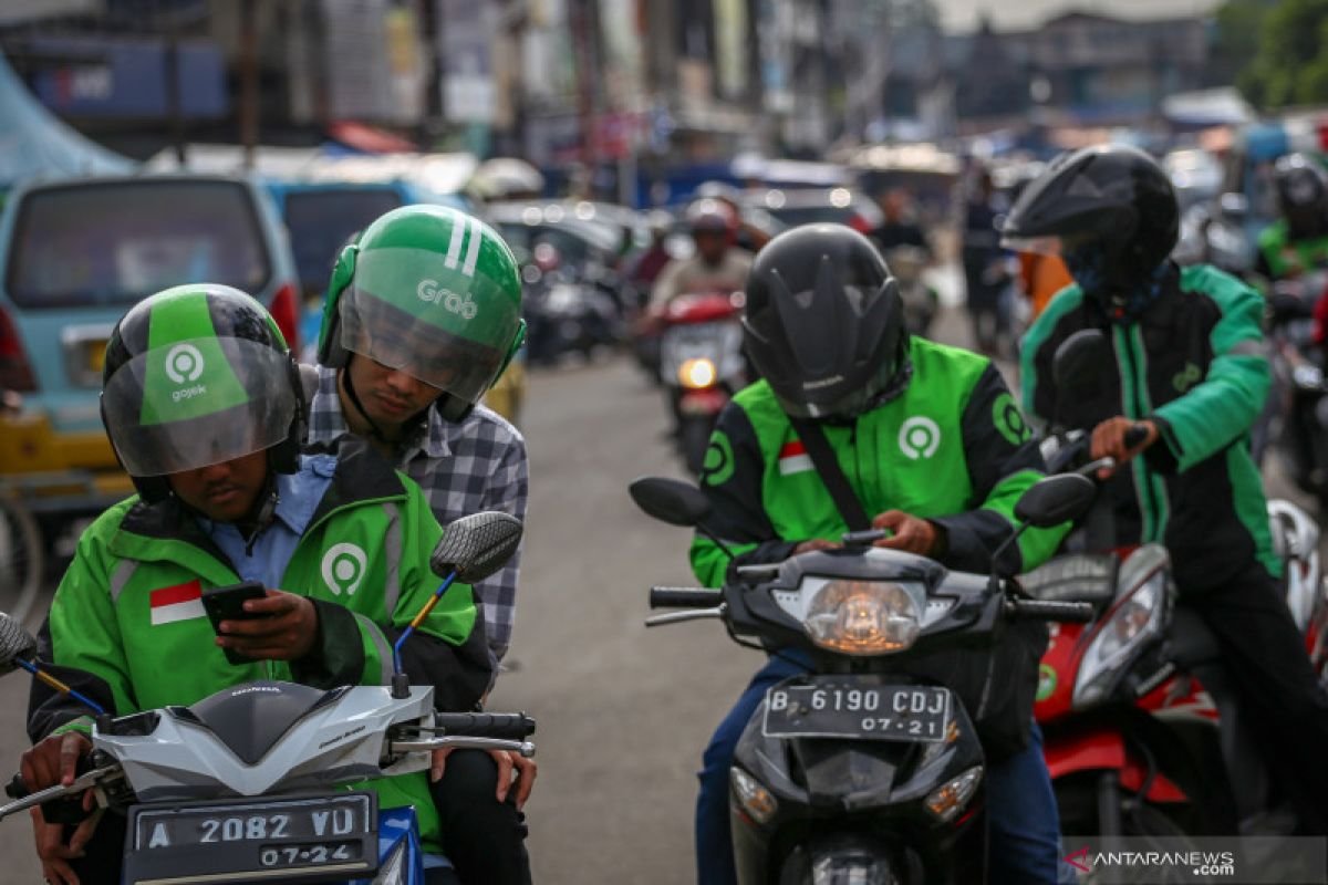 Gojek dan Grab Resmi Terapkan Potongan Komisi Ojol 8 Persen. - thewasesanews.com