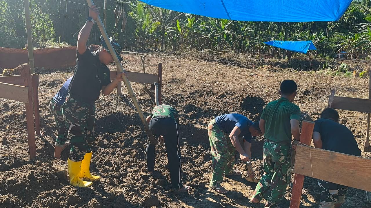 bakti-tni-bangun-jembatan-gantung-nias-utara. - thewasesanews.com