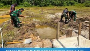 satgas yonif 645 gty pembangunan gereja airu. - thewasesanews.com